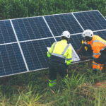 Engineer Checking solar panels in agriculture farm land. Enginee